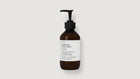 An amber glass pump bottle of ARNEUX hydrating body lotion with a black dispenser and a white label, centered on a light gray background