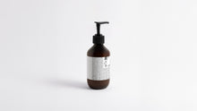 HYDRATE hydrating body lotion amber bottle side profile showing back label and pump detail