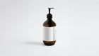 LATHER body wash amber bottle side view showing back label ingredient list