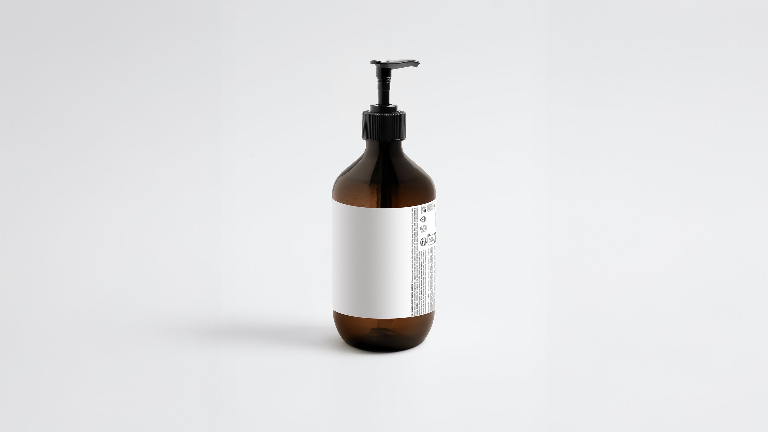 LATHER body wash amber bottle side view showing back label ingredient list