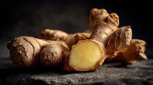 Sliced fresh ginger root close-up, warming aromatic ingredient in LATHER ginger body wash