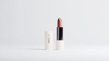 MATTE lipstick Terracotta Nude bullet and cap upright on white background, slim tube profile view