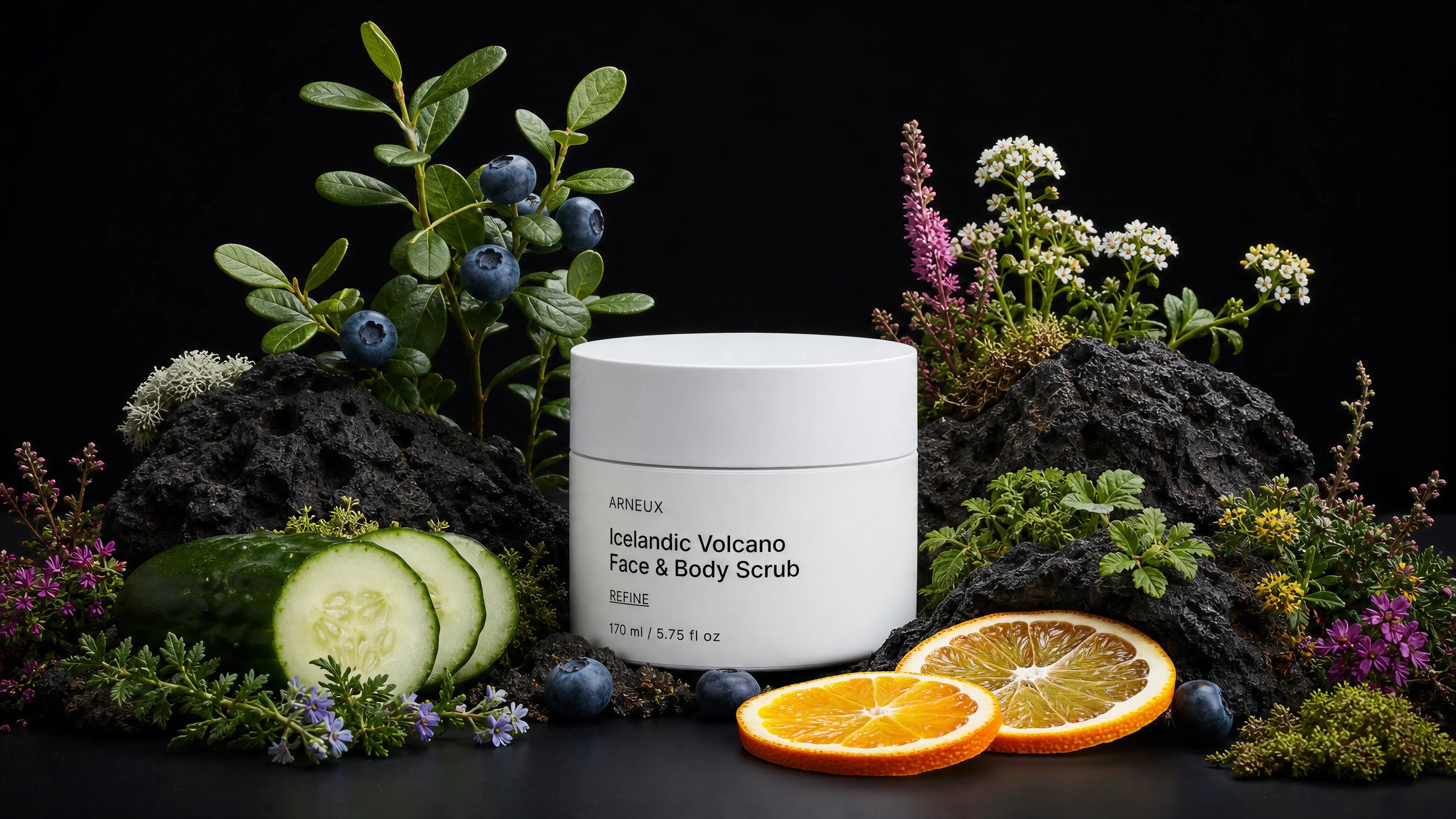 REFINE scrub jar on volcanic rock with blueberries, cucumber, orange slices and wildflowers