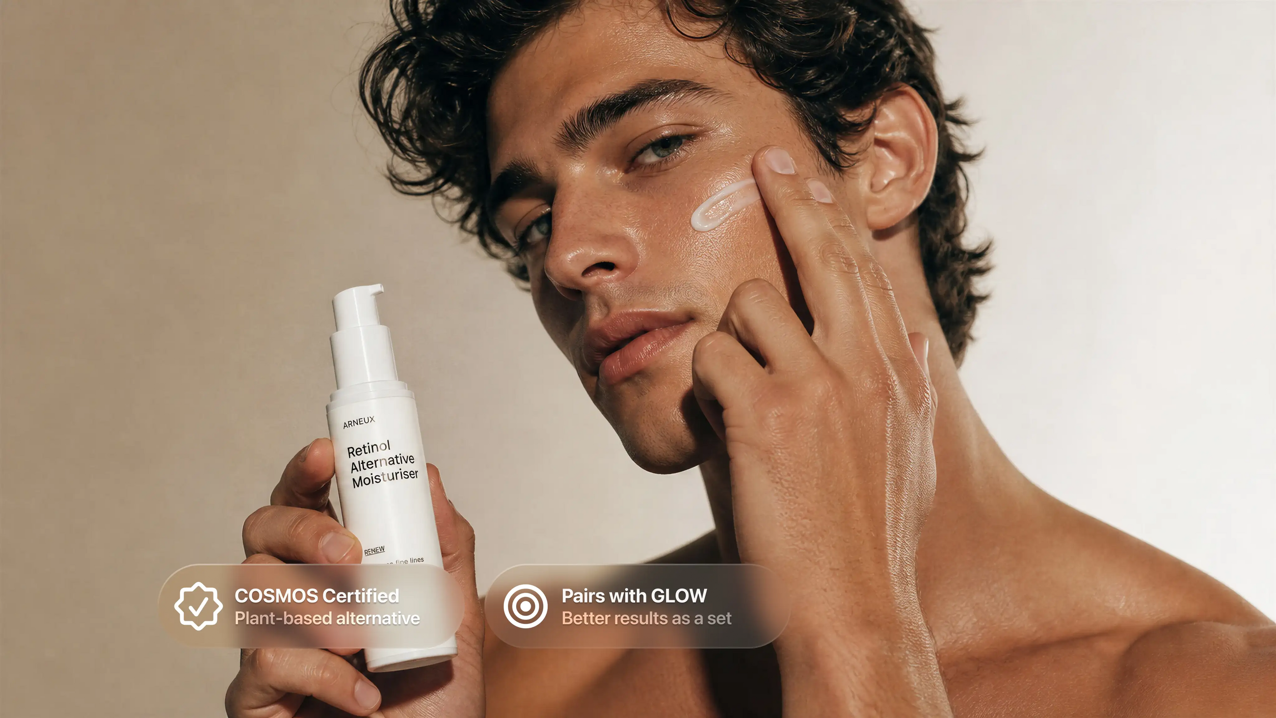Man applying RENEW retinol alternative moisturizer to cheek, COSMOS certified pairs with GLOW callout