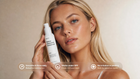 Woman holding RENEW retinol alternative moisturizer, smooths firms daily no irritation or peeling callouts