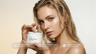 Woman applying RESCUE keratin hair mask to wet hair, deep keratin repair cuts breakage callouts