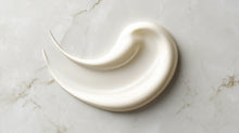 Keratin intensive hair mask thick white cream texture swatch on marble, dense repairing consistency