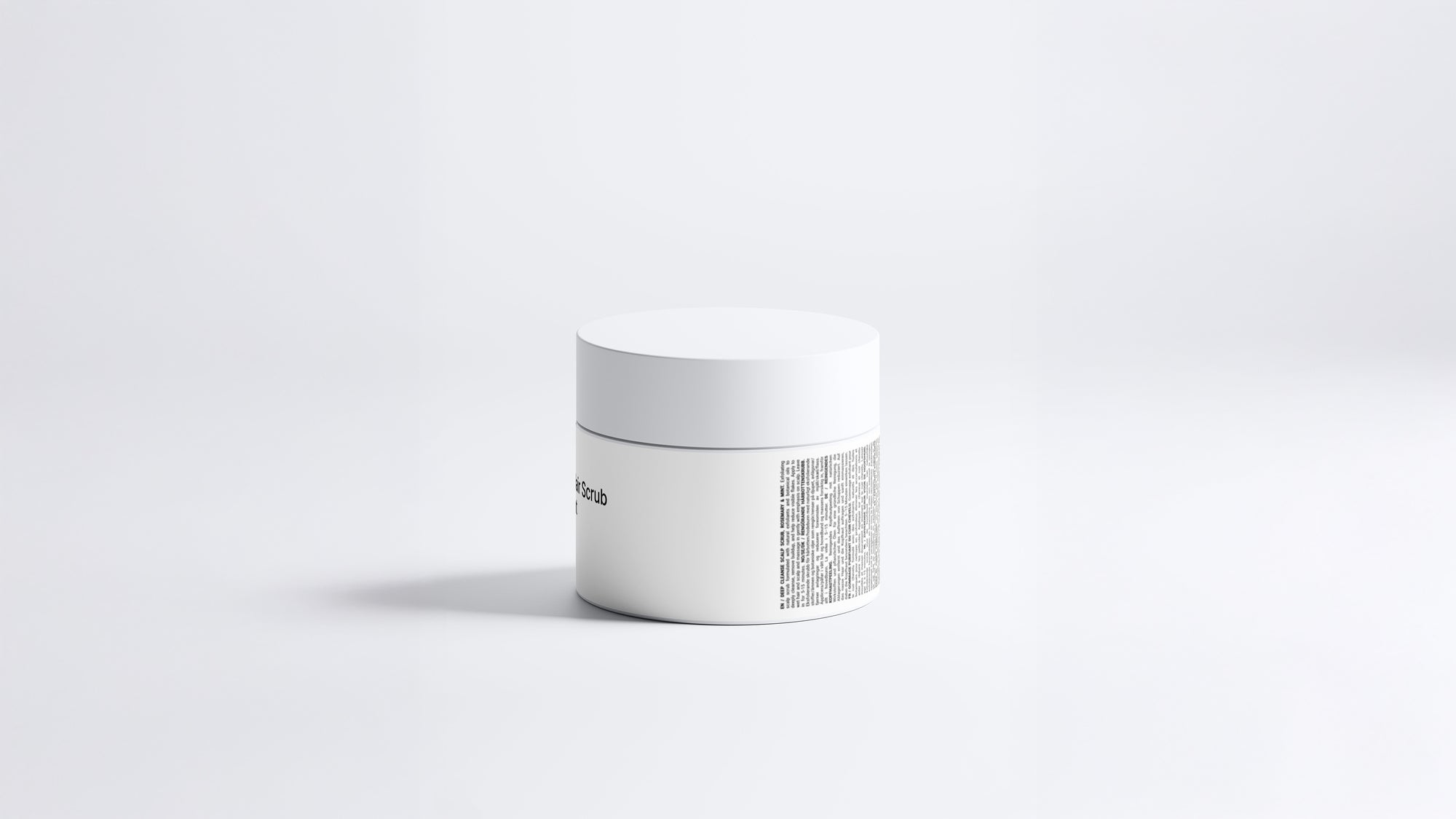 RESET deep cleanse hair scrub jar side view showing back label text on grey background