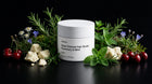 RESET hair scrub jar with rosemary, mint, edelweiss, cherries and shea butter on black background