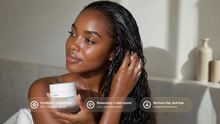 Woman massaging RESET hair scrub into wet hair, exfoliates buildup rosemary mint revives dull hair callouts