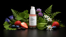 REVIVE serum bottle with strawberries, blueberries, ferns, edelweiss and wildflowers on black