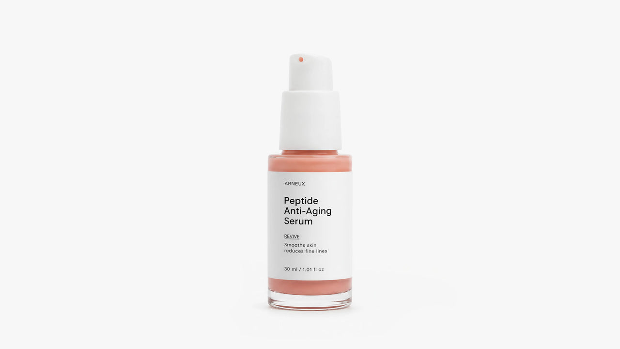 Arneux REVIVE peptide anti-aging serum pump with glass bottle, front label on grey background