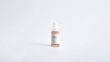 Arneux REVIVE peptide anti-aging serum pump with glass bottle, front label on grey background