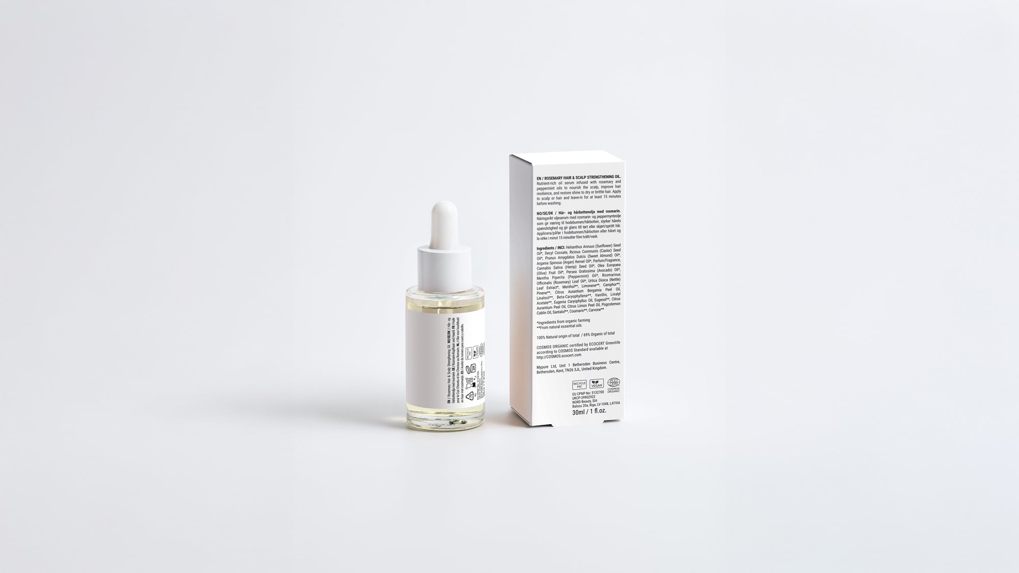 ROOT rosemary hair oil bottle beside box back panel showing full ingredient list