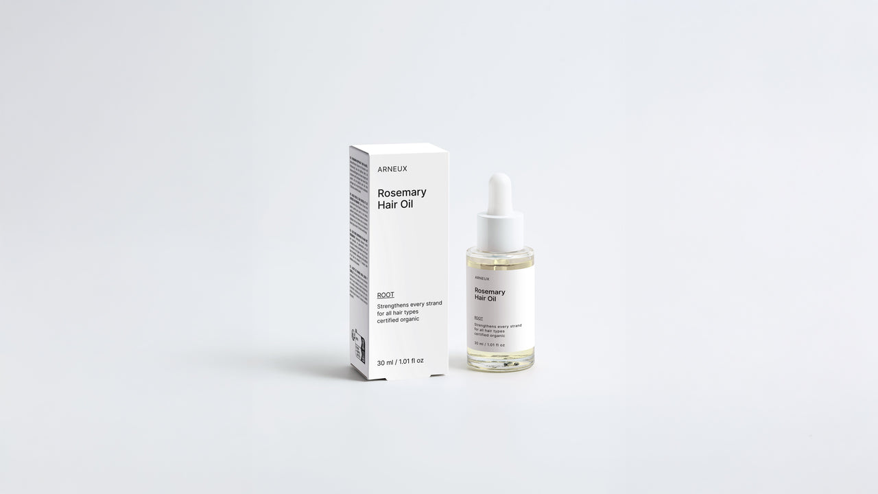 ROOT rosemary hair oil dropper bottle and box packaging set on grey background