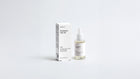 ROOT rosemary hair oil dropper bottle and box packaging set on grey background