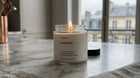 Arneux LAVENDER travel candle burning on marble surface, soft quiet bloom natural soy wax evening ritual