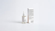 SHIELD prebiotic barrier serum bottle beside box back panel showing full ingredient list
