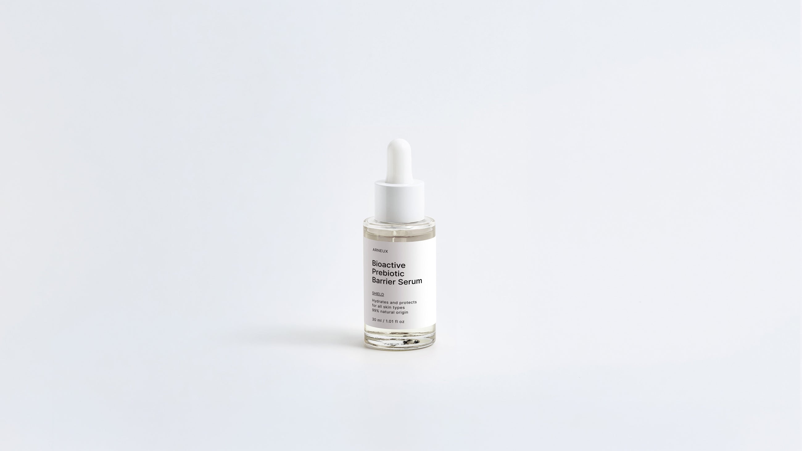Arneux SHIELD bioactive prebiotic barrier serum dropper bottle, front label on white background