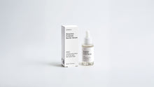 SHIELD prebiotic barrier serum dropper bottle and box packaging set on grey background