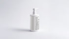 SMOOTH keratin volume boost conditioner bottle side view showing back label on grey background