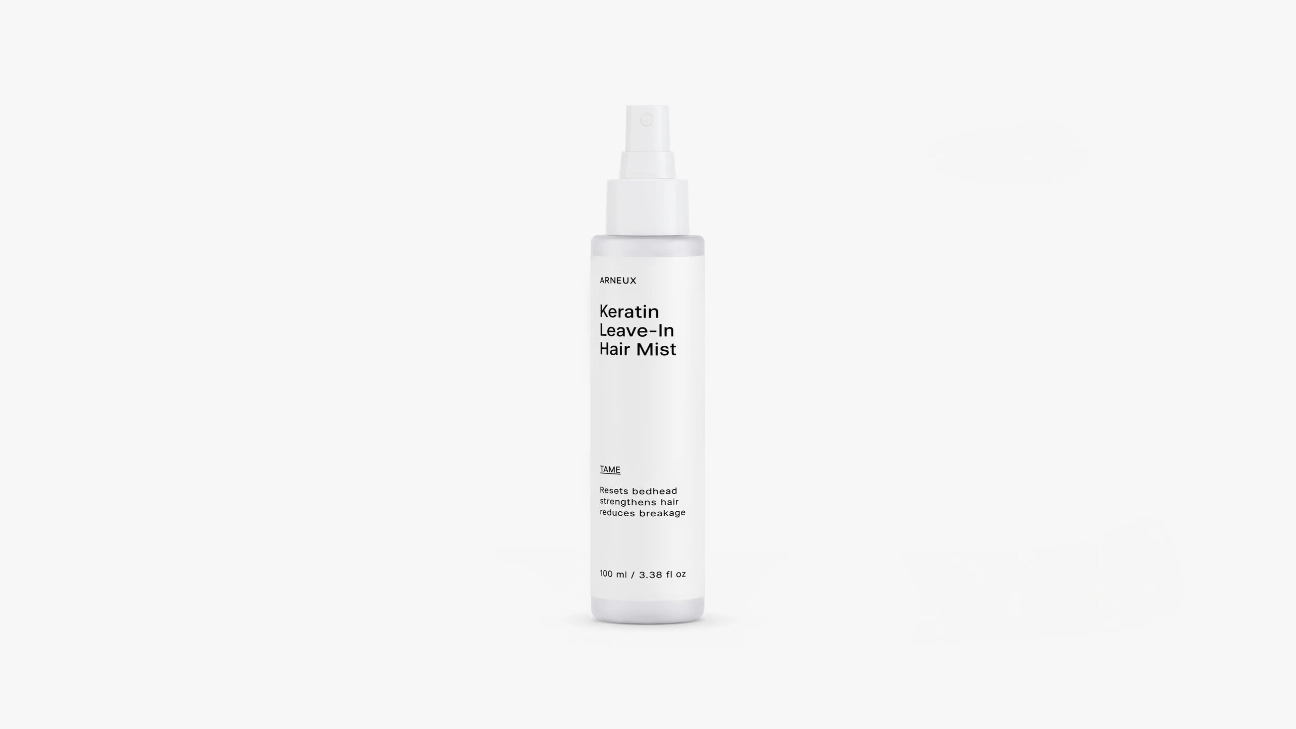 ARNEUX TAME keratin leave-in hair mist spray bottle, front label on white background