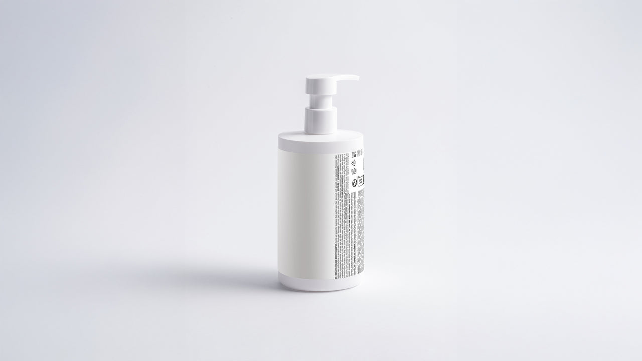 WASH keratin volume boost shampoo bottle side view showing back label on grey background