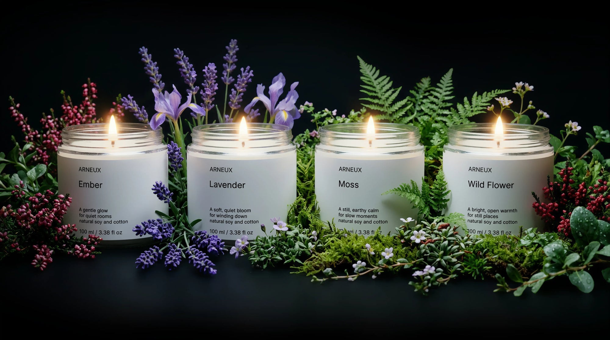 ARNEUX ILLUMINATE candle set with lavender and wild flower botanicals on dark background