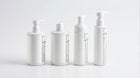 LITTLE baby collection four bottles showing side labels on marble, full product set back view