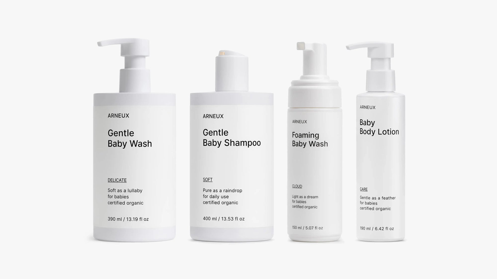 Four bottles of ARNEUX SOFT DELICATE CLOUD and CARE products on a white background