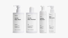 Four bottles of ARNEUX SOFT DELICATE CLOUD and CARE products on a white background