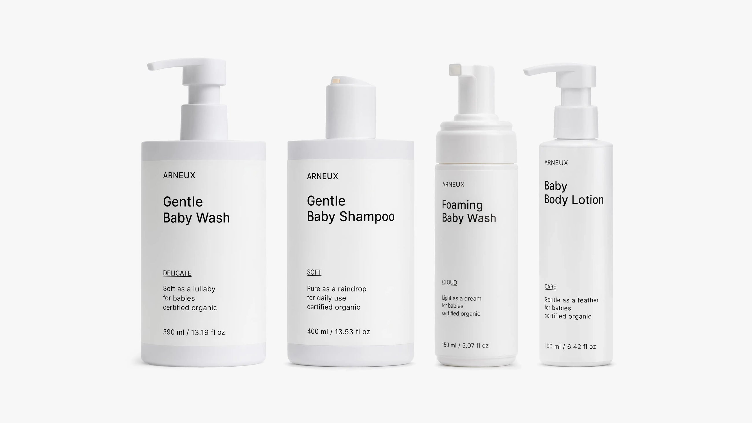 Four bottles of ARNEUX SOFT DELICATE CLOUD and CARE products on a white background